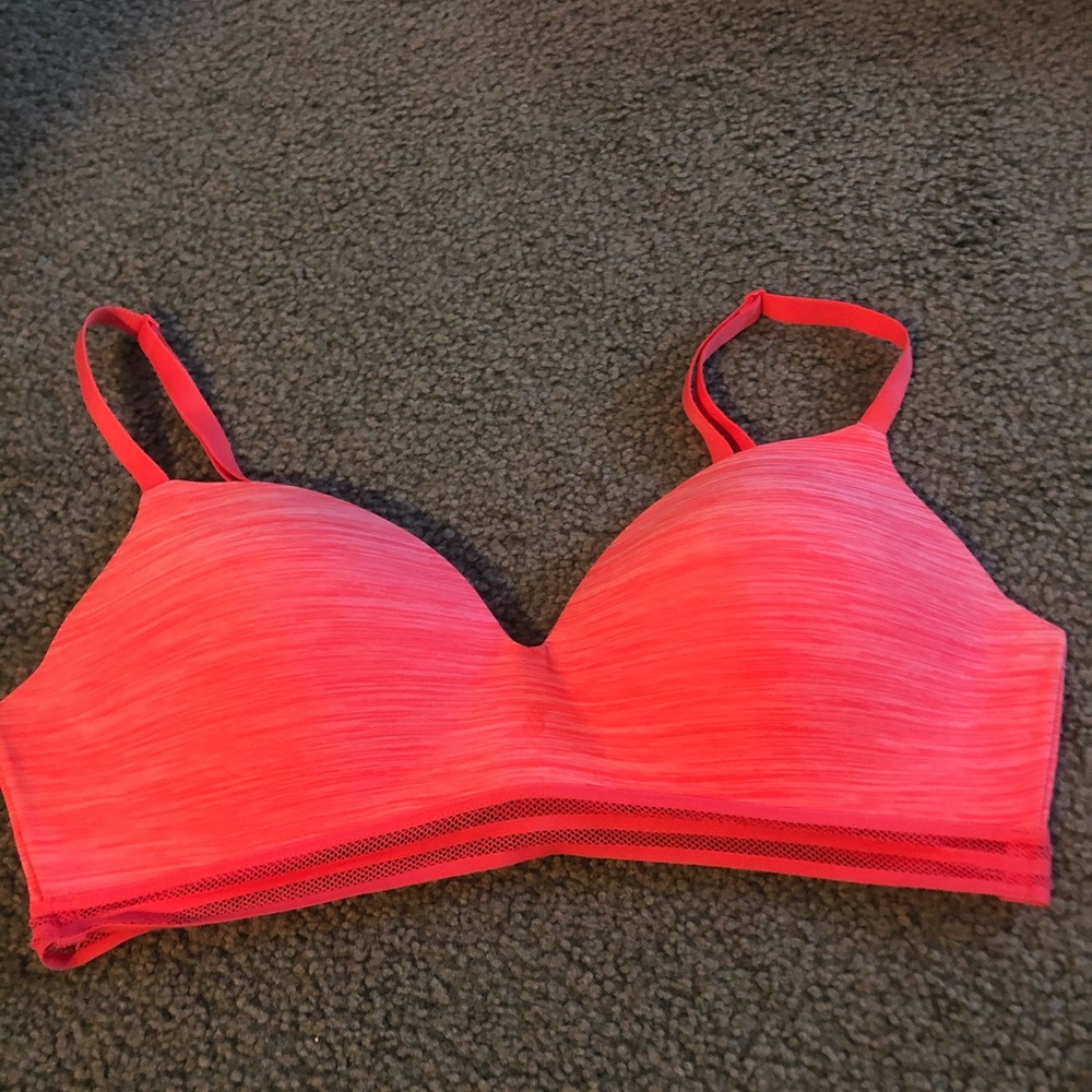 peach colored VS sports bra